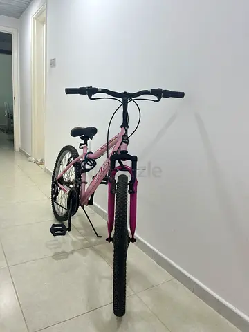 Lightly used pink kids mountain bike - 24 inch