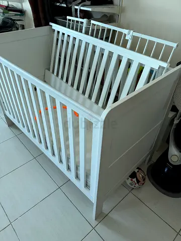 Sturdy White Wooden Baby Crib
