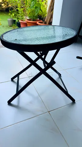 Rocking chairs(2) and a Small round folding glass-top side table, used
