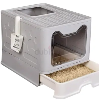 Closed-top cat litter box with pull-out tray. Same model but different color- light grey and white.