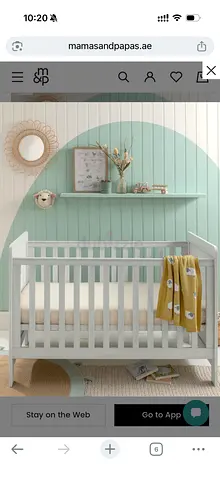 Mamas and papas white wood baby cot / crib, perfect condition, two heights.