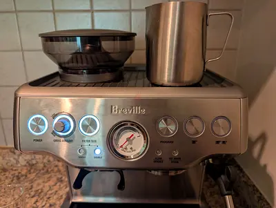 Breville Barista Express machine with built-in grinder and milk frother - stainless steel