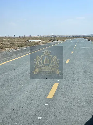 For sale in Sharjah Rawdat Al Qurt area Commercial land, distinguished location