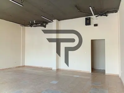A neat and clean shop, perfectly suitable for a medical equipment showroom or drug store, with appr