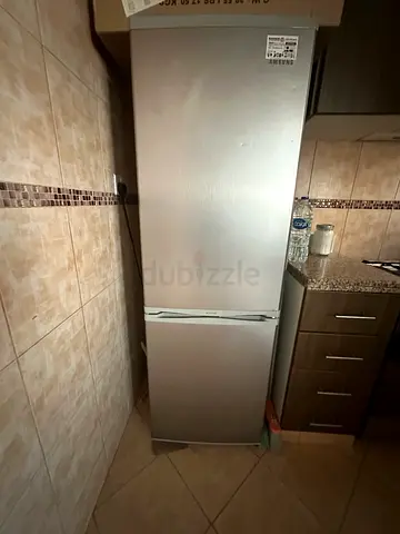 Silver bottom-freezer refrigerator – good condition