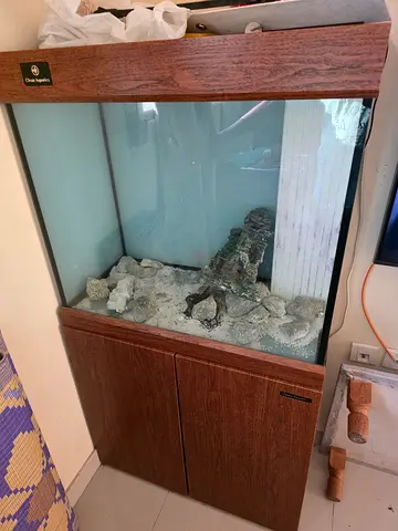 Clear Aquatics wood finish glass aquarium with cabinet, remote controlled light. Very good condition