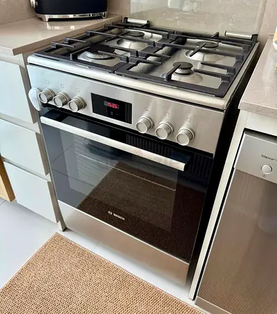 Bosch gas with electric oven stove like new 60/60cm free delivery with warranty