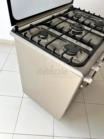 Barely used freestanding gas cooker with 5 burners and oven 90cm width