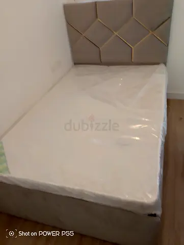 Single upholstered bed with headboard - good condition