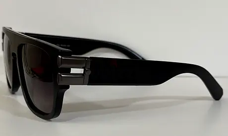 Dark rectangular sunglasses in good condition, not used
