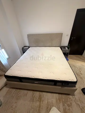 King size mattress with upholstered bed base (good condition)