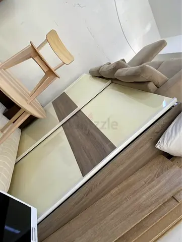 Sliding Door Wardrobe / Armoire in Light Wood and Cream Finish