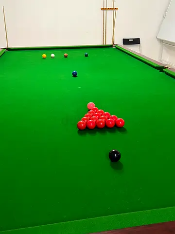 Full-size snooker table with cues and balls - good condition