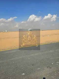 For Sale in Sharjah Rawdat Al Qurt Area Residential Investment Land Near Khor Fakkan Road Freehold f