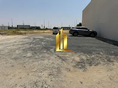 Land for sale at a bargain price in Al-Hawshi, Sharjah, on a main road, close to the mosque (300 meters), freehold ownership for Arabs.