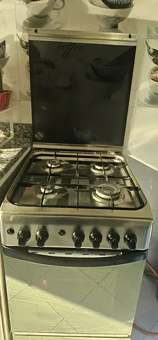 Used freestanding Ariston gas cooker with oven - stainless steel