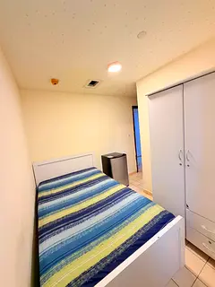 Cozy maidroom with attached bathroom