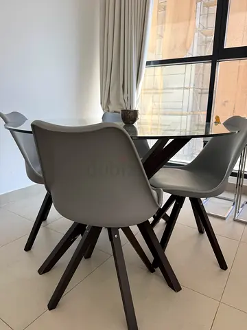 Modern Dining Set with Glass Top Table and Grey Chairs