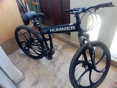 Hummer branded folding mountain bike - good condition