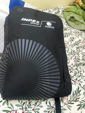 Black INPEX Jodoco backpack — compact daily travel backpack