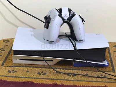 PlayStation 5 Console with DualSense Controller (1 Month used) + wireless charger + 3 games