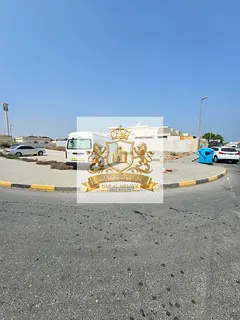 For Sale in Sharjah Al Hazana Area Residential Land Corner on Two Streets Ground Floor and First Flo