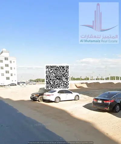 Residential/commercial land for sale in Al-Aliya area, street and alley.