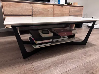 Modern marble-style coffee table with lower shelf