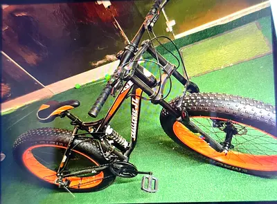 Used Challenger Fat Tire Mountain Bike - 26 Wheels, Dual Suspension, Orange/Black