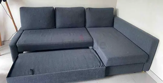 IKEA L shap Sofa store cum bed you can fix the storage lift or Right
