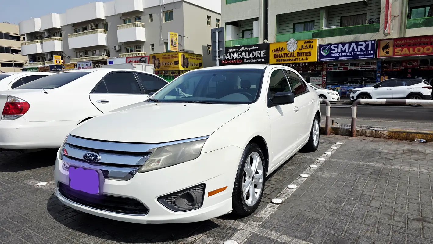 Ford Fusion 2012 — photo 1 of 6