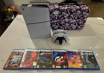 PS5 Slim Disc UAE Jumbo + 2 Controllers + 6 Games + Hard Case | Excellent Condition
