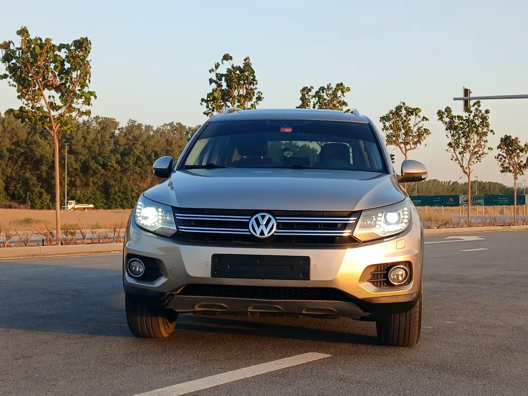 Volkswagen Tiguan 2013 — photo 1 of 16
