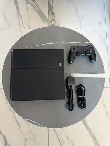 PlayStation 4 with DualShock 4 Controller - Good Working Condition