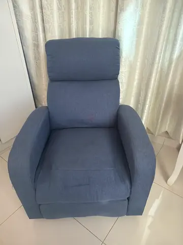 Single blue fabric recliner armchair in good condition - كنبه مع رفع رجلين