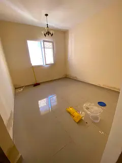 Annual Apartment for Rent in Al Qulayaah, Sharjah A spacious one-bedroom apartment with a large livi