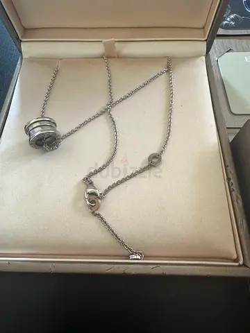 Silver pendant necklace with circular charm