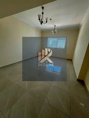 **Two-bedroom apartment with a living room in Al Majaz 2 for annual rent.** The unit features **central air conditioning**, a **central gas system**,