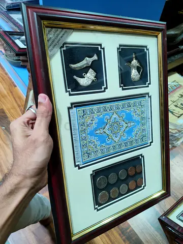 Framed Middle Eastern Collectible Display with Coins, Miniature Daggers 39*28cm