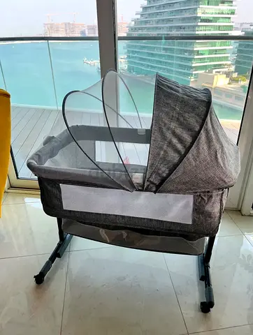 grey portable baby bassinet