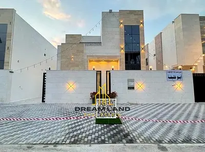 Direct from the owner, including all ownership fees: a villa in one of Ajman's most luxurious villas, custom-built and finished to a super deluxe stan