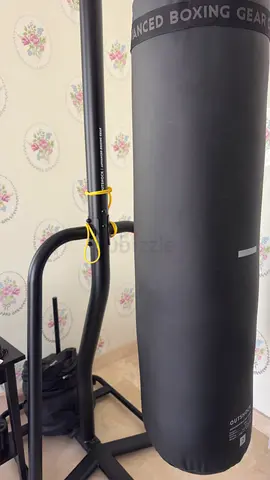 Standing heavy punching bag with frame - good condition. Price negotiable