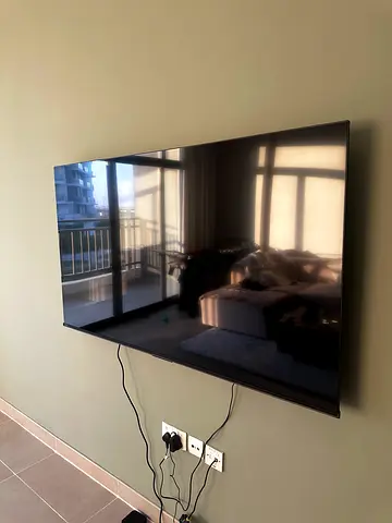 65 inch TV, mirror and x2 bed side cabinet