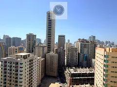 Two bedroom apartment and living room in Al Nahda Sharjah with balcony open view two bathrooms prime