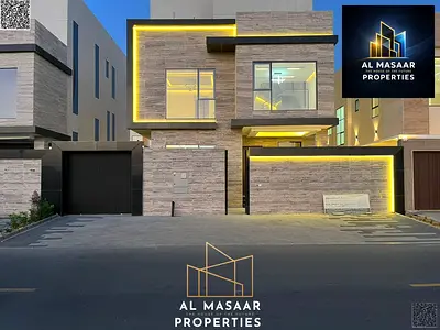 Luxury 3-story villa for sale in one of Ajman's best areas, including registration and ownership fees, with excellent finishing and a strategic locati