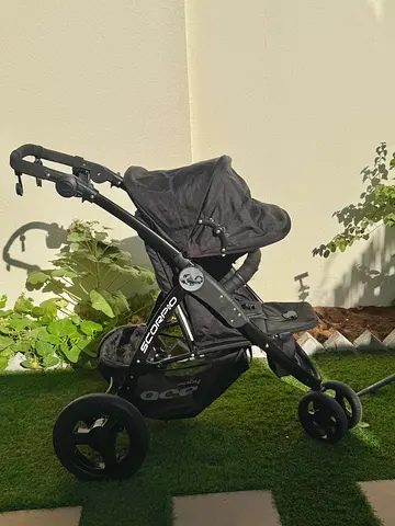 Baby stroller with baby bag and cup holder