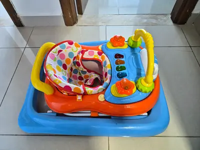 Baby activity walker with music and removable toy tray