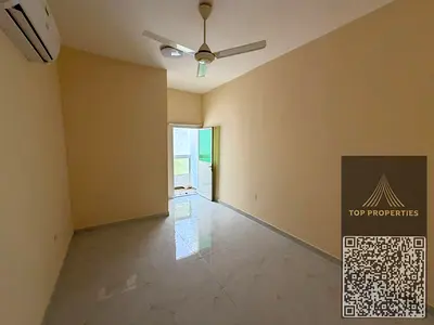 A three-bedroom apartment and a hall for annual rent in Al Alia - Ajman | Spacious spaces, a balcony, and a great location near Mohammed bin Zayed Str