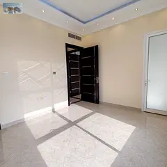 Three-bedroom apartment with a living room for annual rent in Al Rawda areaPrime location upscale re