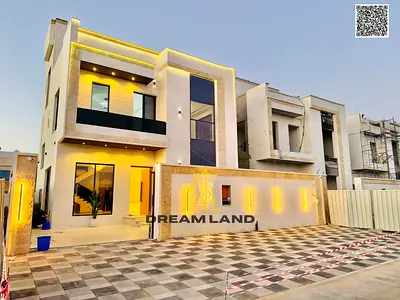 Luxury villa in **Al Zahia – Ajman**, ready for immediate occupancy, featuring high-end finishes and spacious living areas. **Freehold ownership for a
